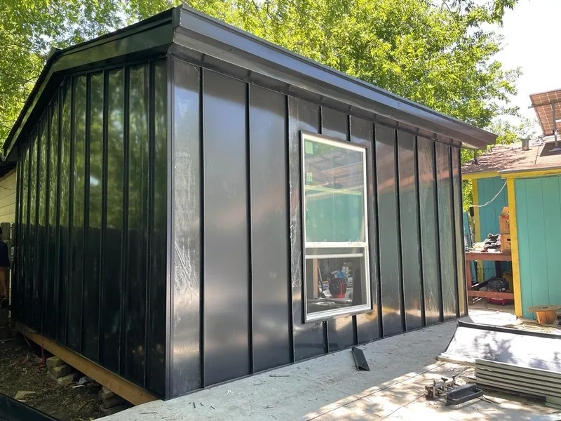 Black standing seam metal wall panels for Roof Inspection in Kenosha