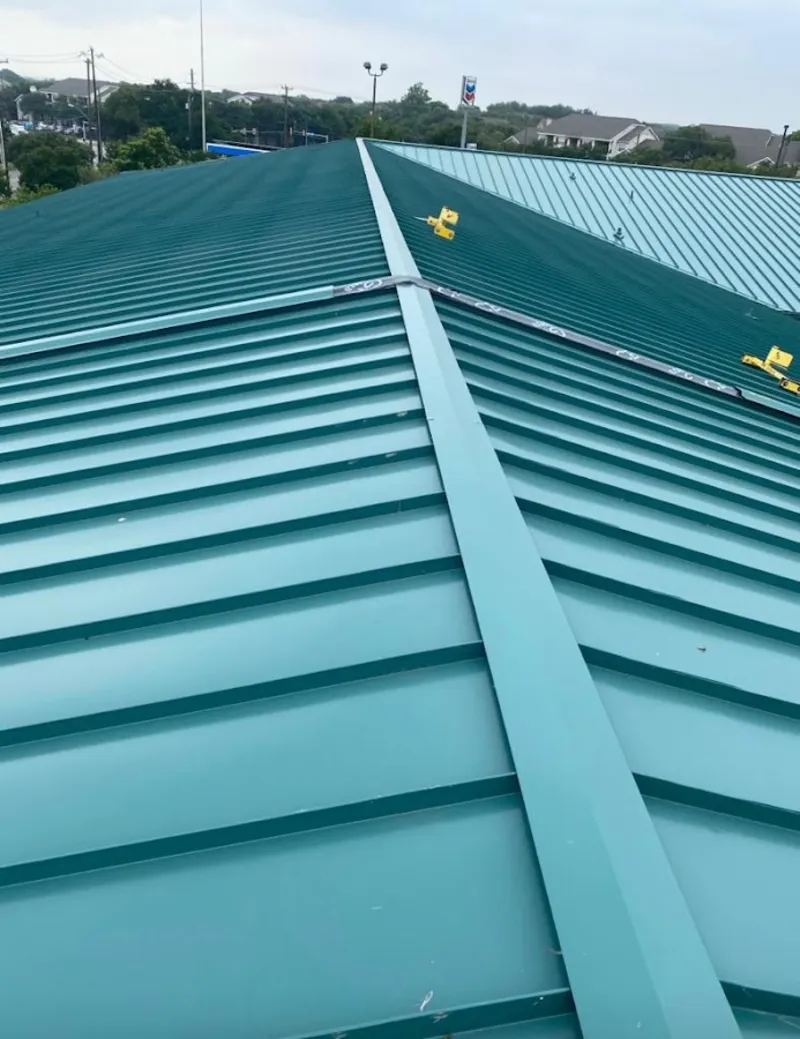 Green commercial metal roof ridge and valley for Metal Roof Repair in Kenosha