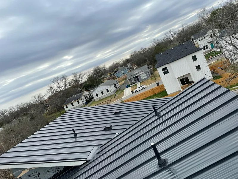 Standing seam metal roof panels with vents for Skylight Repair in Kenosha